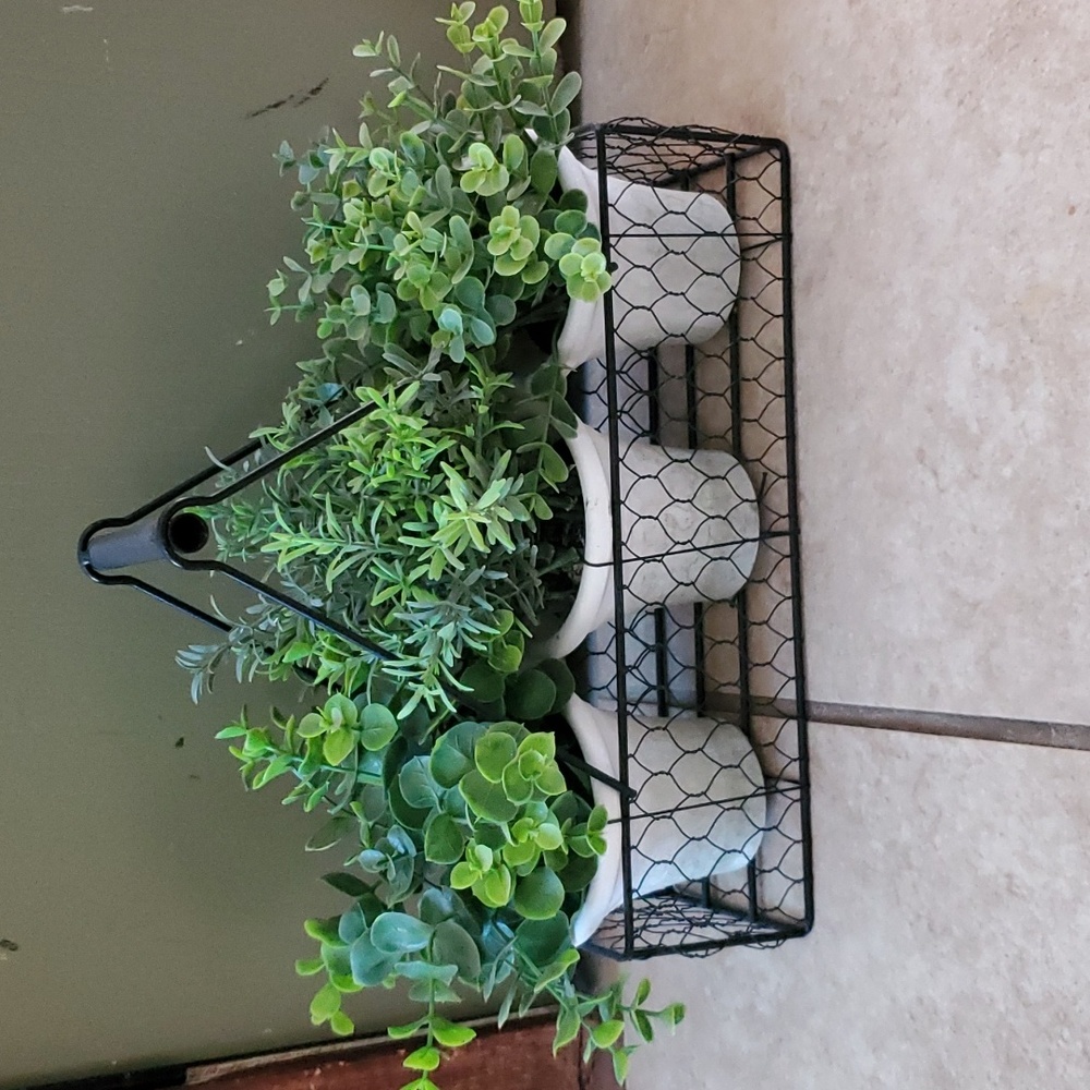 Faux plants in basket